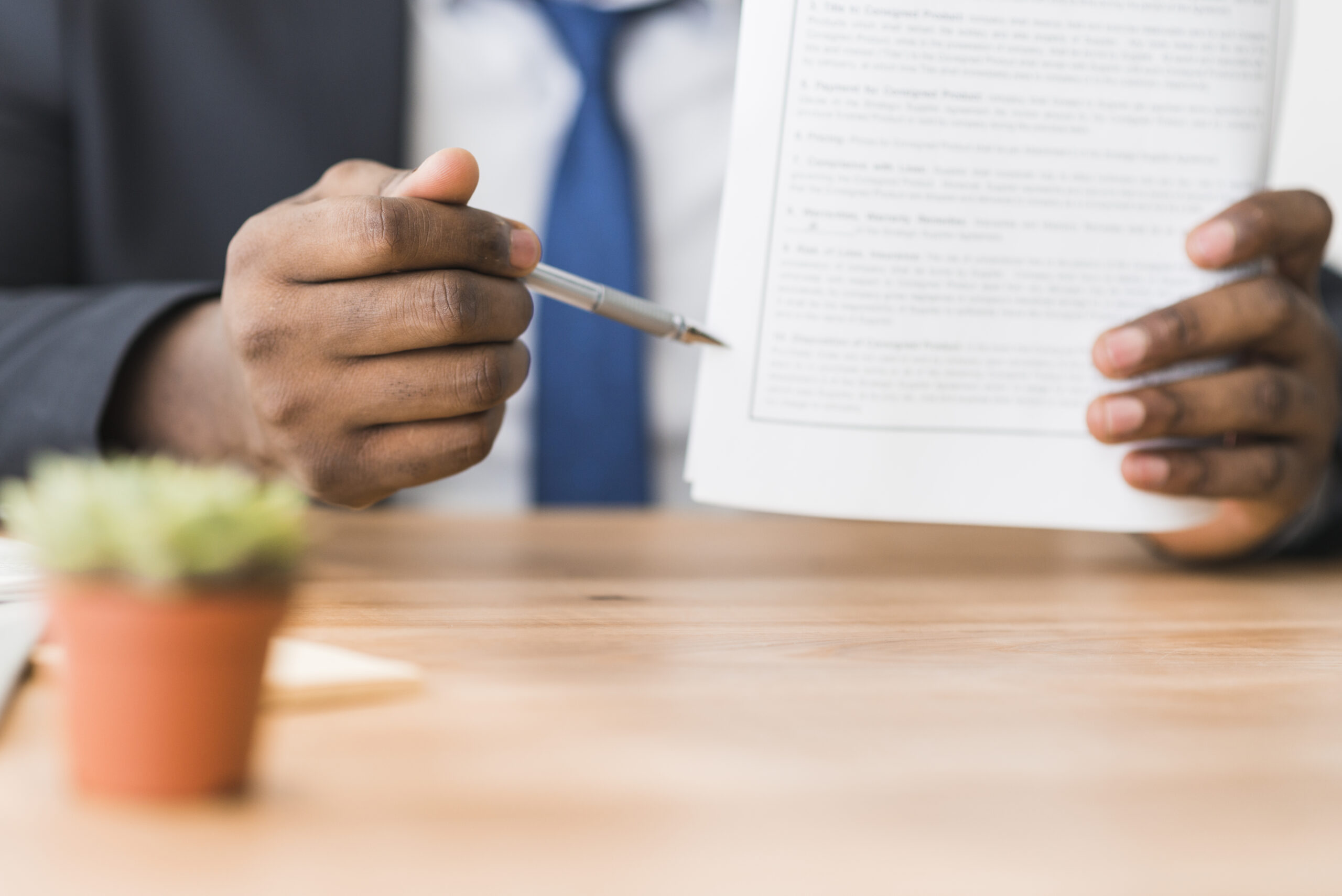 a consultant taking a client through a contract